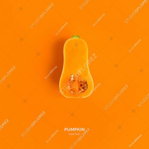 Creative layout made of pumpkin on the orange background. Flat lay. Food concept.