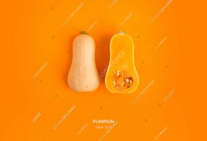 Creative layout made of pumpkin on the orange background. Flat lay. Food concept.