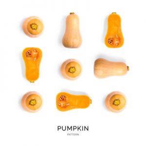 Seamless pattern with pumpkin. Tropical abstract background. Pumpkin on the white background.