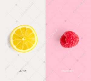 Creative layout made of raspberry and lemon. Flat lay. Food concept.