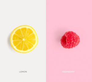 Creative layout made of raspberry and lemon. Flat lay. Food concept.