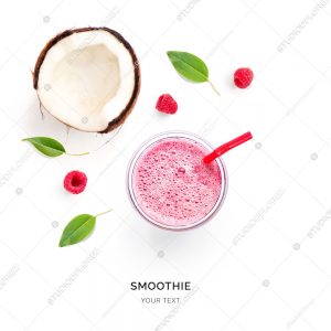 Creative layout made of raspberry and coconut smoothie. Flat lay. Food concept. Smoothie on the white background.