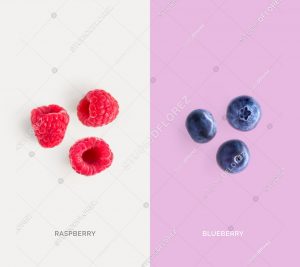 Creative layout made of raspberry and blueberry. Flat lay. Food concept.