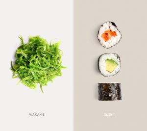Creative layout made of sushi and wakame. Flat lay. Food concept. Macro  concept.