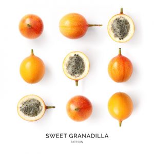 Seamless pattern with sweet granadilla fruit. Tropical abstract background. Sweet granadilla fruit on the white background.