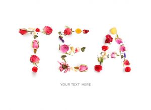 Creative layout made of  word "tea". Flat lay. Food concept. Herbal tea on the white background.