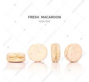 Creative layout made of almond macaroons on the white background. Flat lay. Food concept.