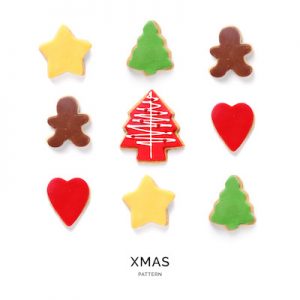 Seamless pattern with christmas cookies. Food abstract background. Cookies on the white background.
