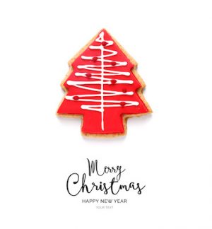 Creative happy new year card made of christmas tree cookie on the white background.  Christmas tree , top view, festive greeting card.