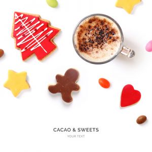 Creative layout made of cacao drink with cookies on white background. Flat lay. Food concept. Christmas cookies.